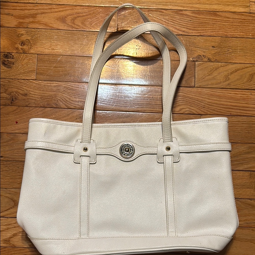 Dooney Bourke off white bag. Red insides- authentic, purchased new at Belk.
